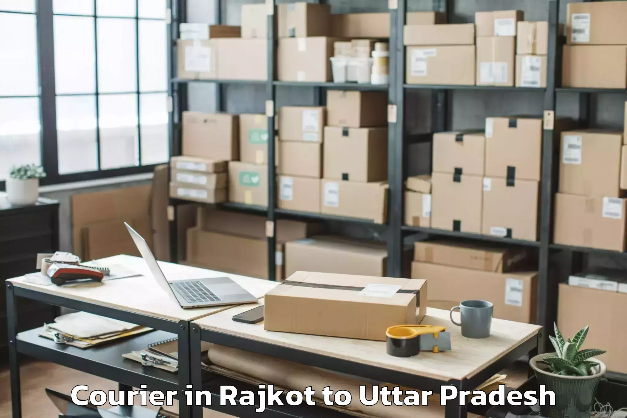 Top Rajkot to Belthara Road Courier Available